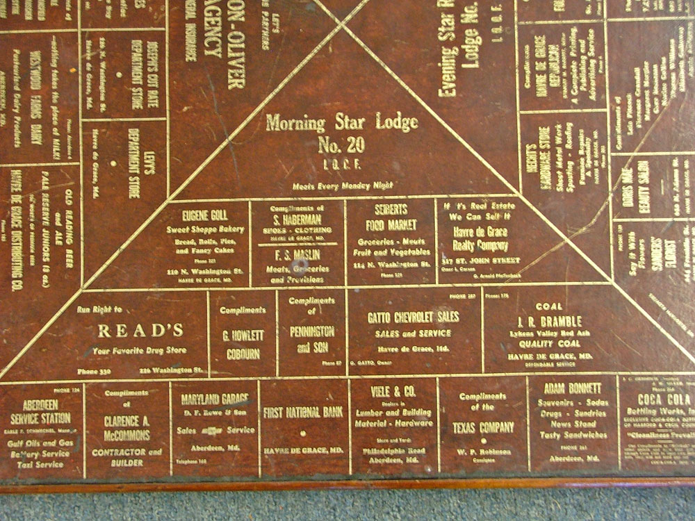 Section 1 of 1940s Advertising on a card table at Bahoukas in Havre de Grace