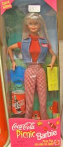 Special Edition Coca Cola Barbie Doll still in box, 1997, Red top, denim vest, red and white checked slacks with various Coca Cola items