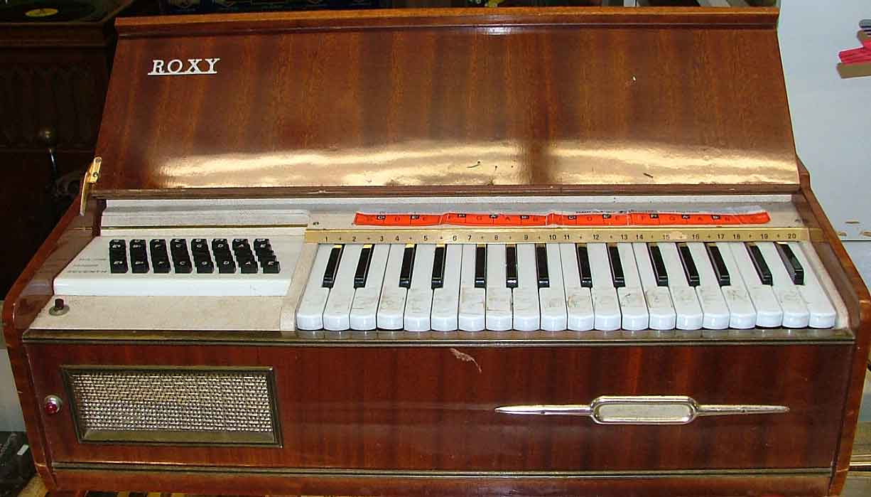 Roxy Chord Organ 1960s and still plays available at Bahoukas Antiques Havre de Grace, MD