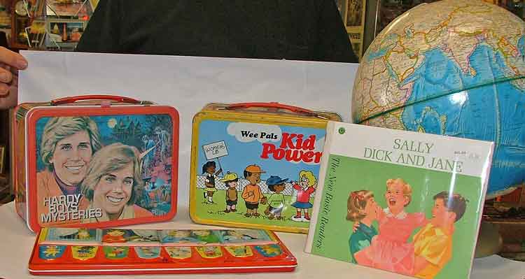 collectible character lunch boxes, Dick and Jane Reader, world globe and a beautiful palette of watercolor paints are just a few of the back-to-school items available at Bahoukas Antiques.