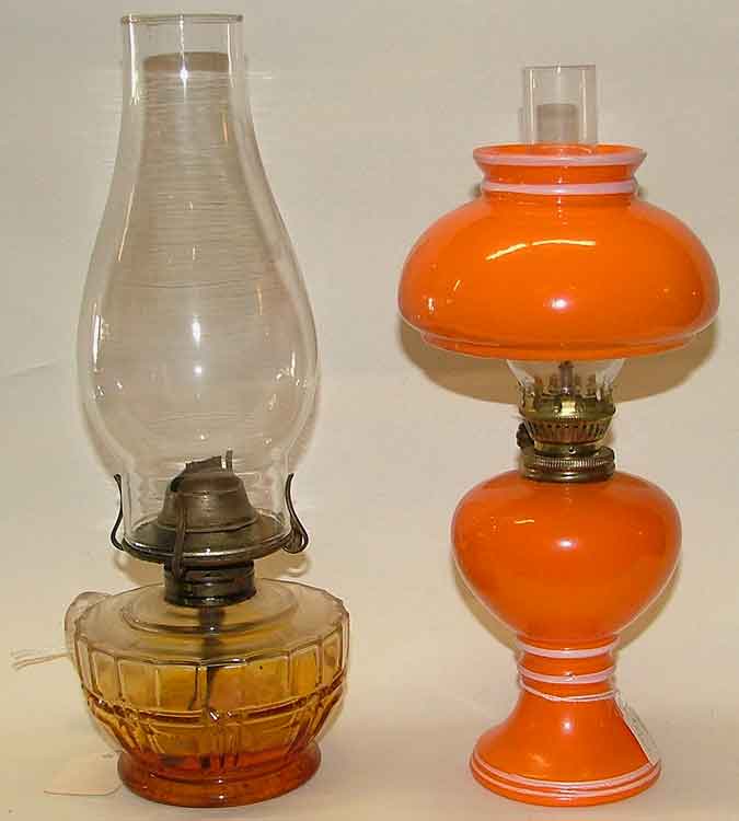 oil - kerosene lamps for home use - one with clear globe - one in orange