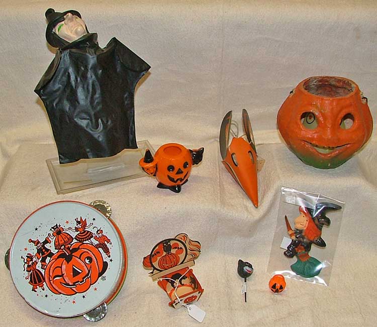 Halloween party items - witch puppet (plastic), pumpkin, favors, small pumpkin for candle, tamborine, and various small items for cake decorating, etc.