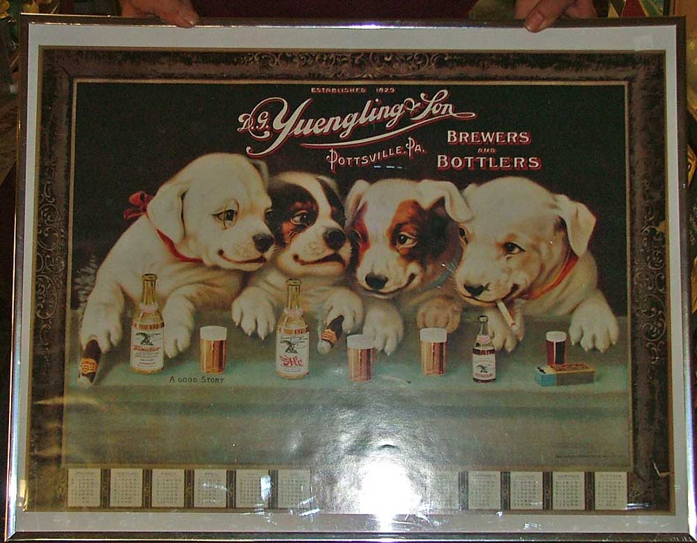Yuengling reproduction of 1907 calendar poster with puppies on it