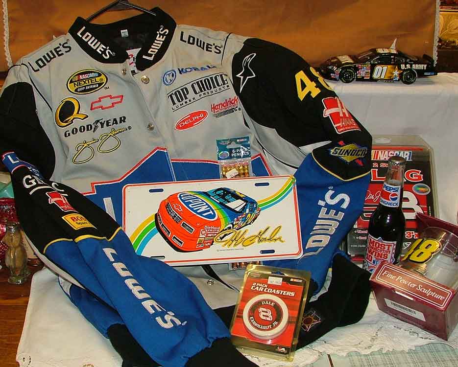 Nascar Collectibles available at Bahoukas Antiques in Havre de Grace including Jimmy Johnson jacket and beer mug, Jeff Gordon License Plate, Richard Petty Pepsi (never opened), Nascar Pencils #20 Tony Stewart, Dale Jr flag #8 and coasters and #01 Army/American Hero model car