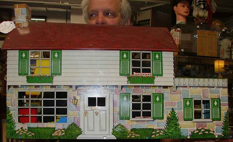 the outside view of this metal doll house at Bahoukas Antiques
