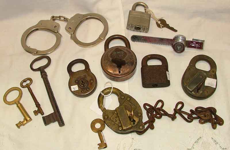 Variety of locks including RR locks (B& O, PARR, Southern Rio Grand Pacific, a showcase lock and even handcuffs
