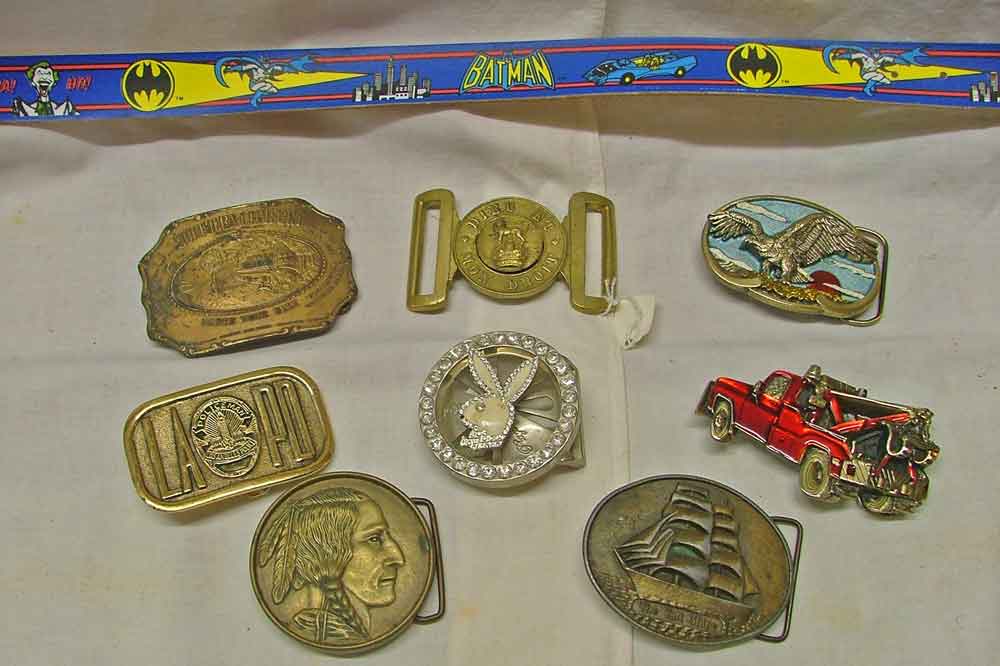 Belt Buckles that include Southern Comfort, an Eagle, LAPD Police Dept, PlayBoy Bunny, Native American, Tall Ship, and a Wrecker Tow Truck plus a Batman Kid's Belt.
