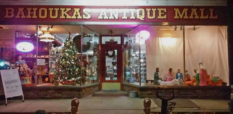 Bahoukas Antique Mall front window - Holiday Decorations with the famous PEZ Christmas Tree and the Nativity on the other side!