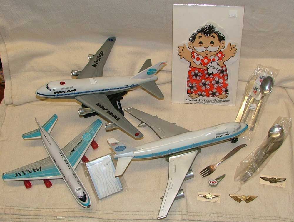 PanAm transistor radio plane, deck of cards, United Air Lines puppet, TWA pilot wings and more models