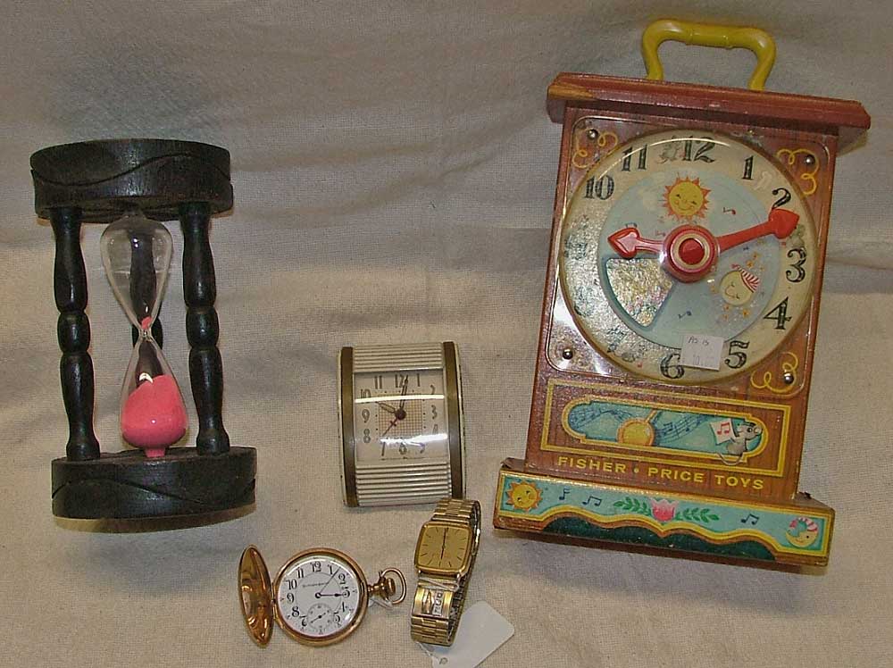 10 min 'hour glass' , Fisher Price clock, Burlington SPecial Pocket Watch, Coca Cola watch w/diamonds, and a travel alarm clock by Westclox