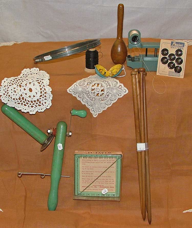 Crafty gifts at Bahoukas Antiques include embroidery hoops, sock darner, hand sewing mahcing, buttons, salknut sewing kit (1950s), tool to make a yarn ball, small weaving loom, wood knitting needles