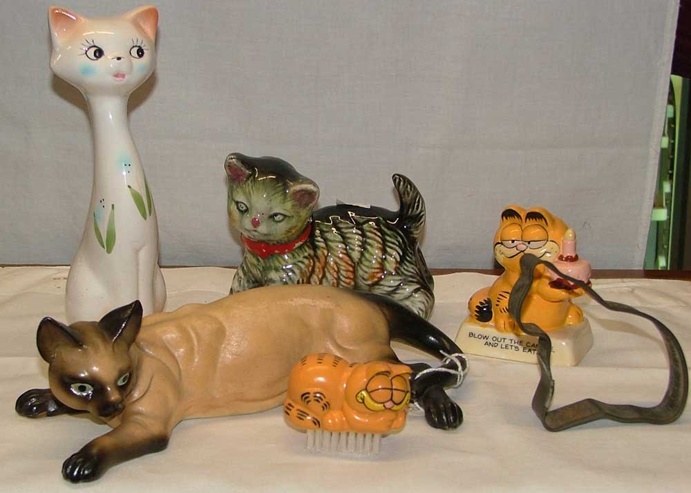 Cat figurines make for great stocking stuffers at Christmas from Bahoukas in Havre de Grace