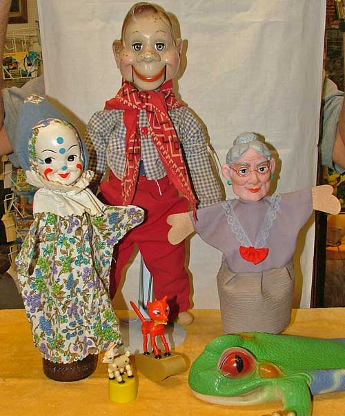 Puppets at Bahoukas in Havre de Grace include Howdy Doody, cloth hand puppet with plastic clown face, lady hand puppet, plastic frog hand puppet, and goat and fox push puppets