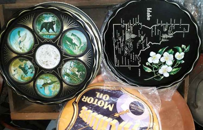 Tin Trays decorated with advertising or painted beautifully  are a beautiful addition to everyday usage and/or entertaining. Available at Bahoukas in Havre de Grace.
