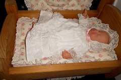 12-tiny-doll-and-cradle