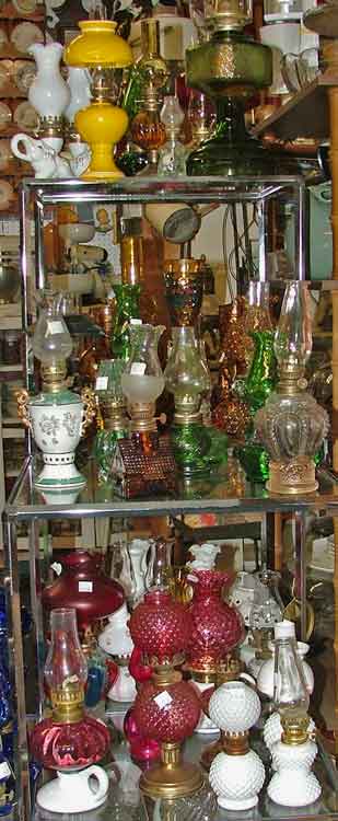 Green and other shades of oil lamps at Bahoukas Antiques in Havre de Grace