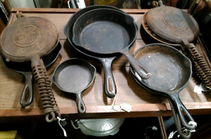 assortment of cast iron pans at Bahoukas in Havre de Grace