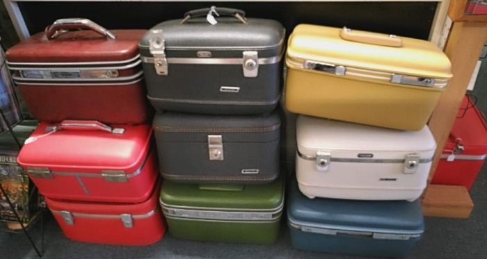 Beautiful and colorful assortment of train cases available at Bahoukas in Havre de Grace.