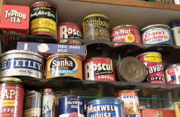 wonderful selection of tin cans available at Bahoukas Antiques - coffee, tea, nuts, toothpaste and more