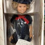 Shirley Temple doll with a variety of 16 outfits at Bahoukas