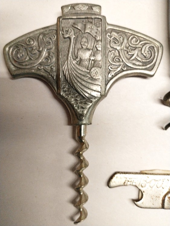 intricately designed handle on a corkscrew