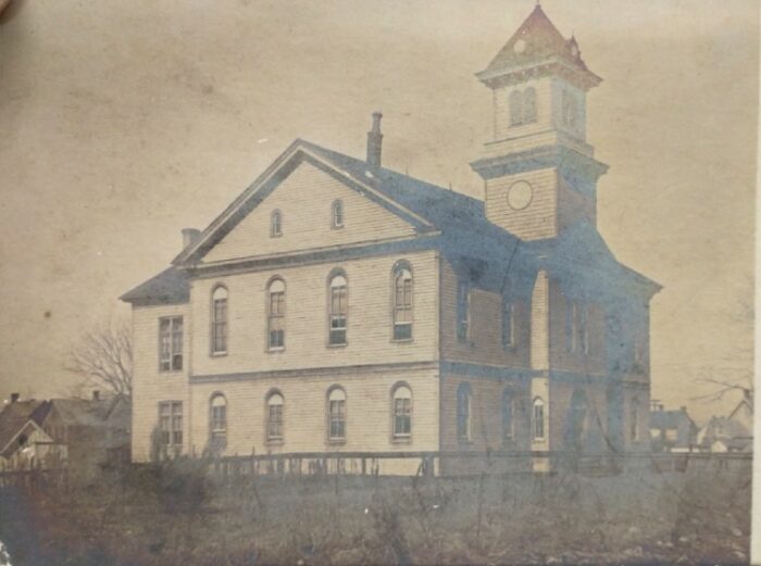 photo that looks like an old school building c. 1906