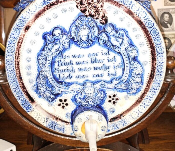 Words from Martin Luther on the end of the Cobalt blue and white German wine cask/dispenser.