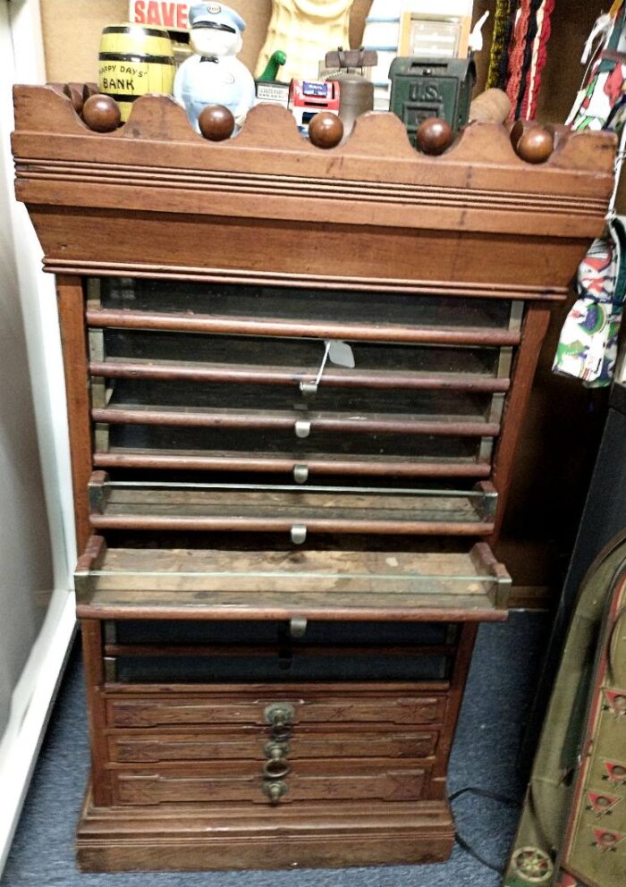 Beautiful 1800s vintage sewing thread display case at Bahoukas Antiques.