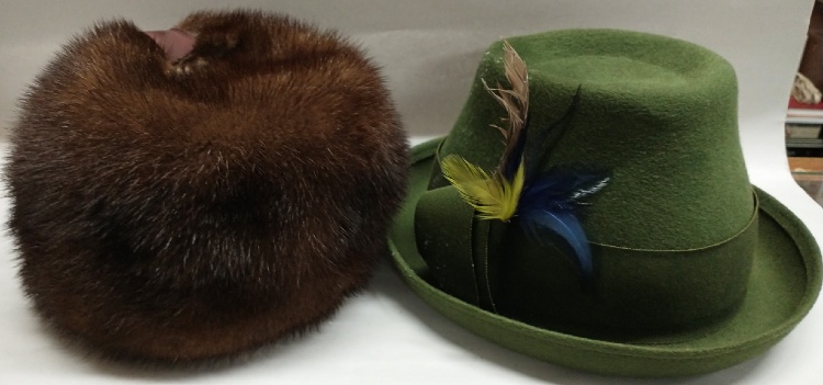 mink fur hat and green felt hat at Bahoukas