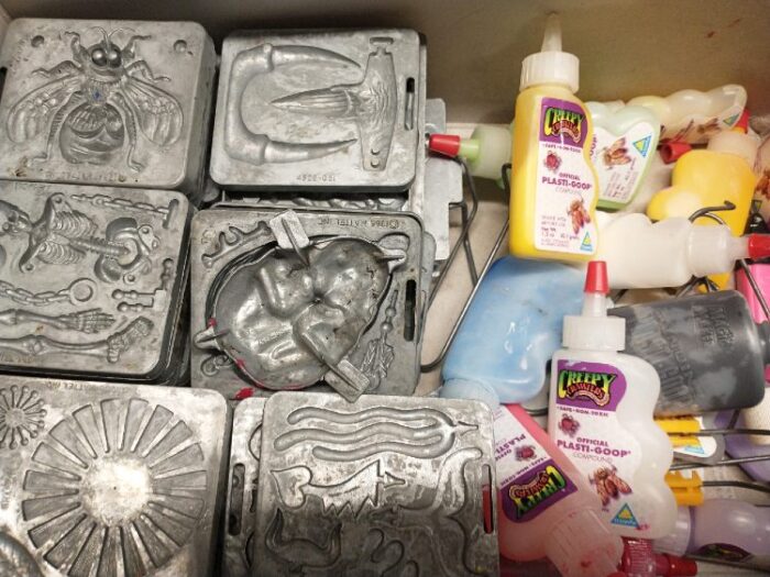 miscellaneous box of Mattel Creepy Crawler molds and plastic goop