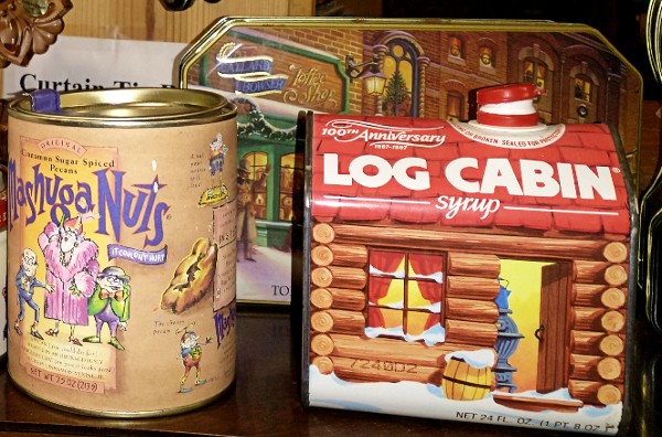 log cabin shaped vintage tin