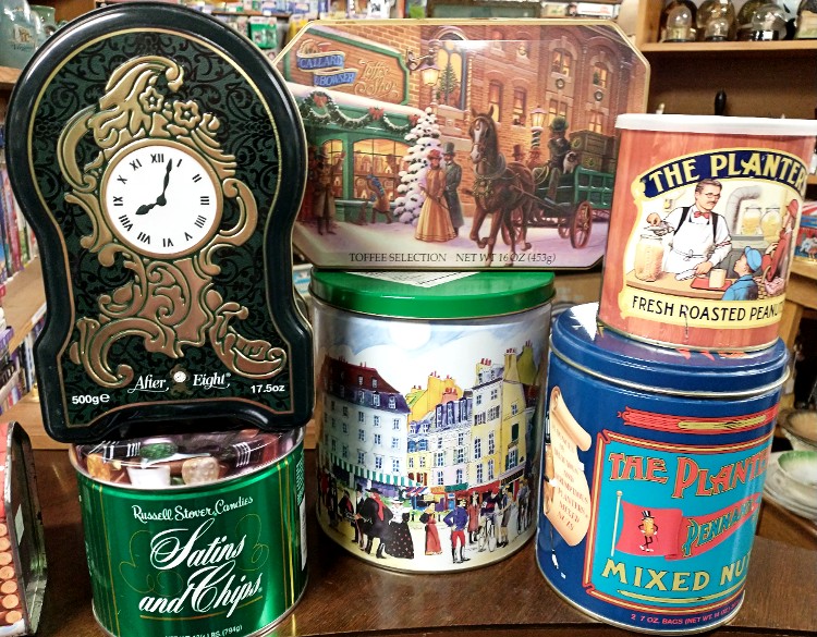 all shapes, sizes, and art in vintage tins