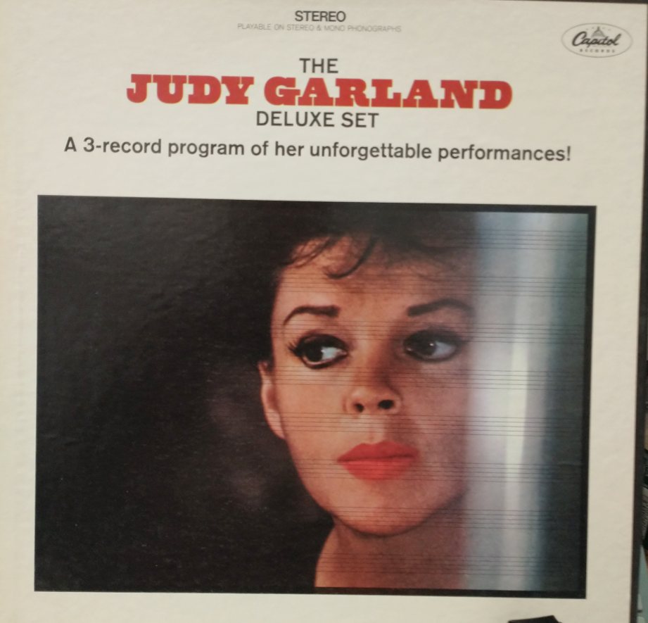 The Judy Garland Deluxe Set - 3-record program of her unforgettable performances.