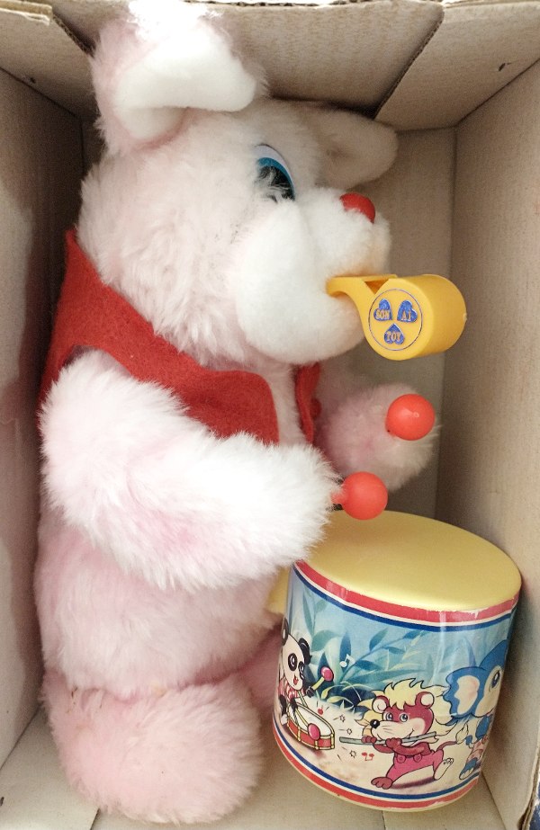 Luck Rabbit - a 1960s vintage toy, battery operated, he has a whistle and plays a drum. Comes with the original box.