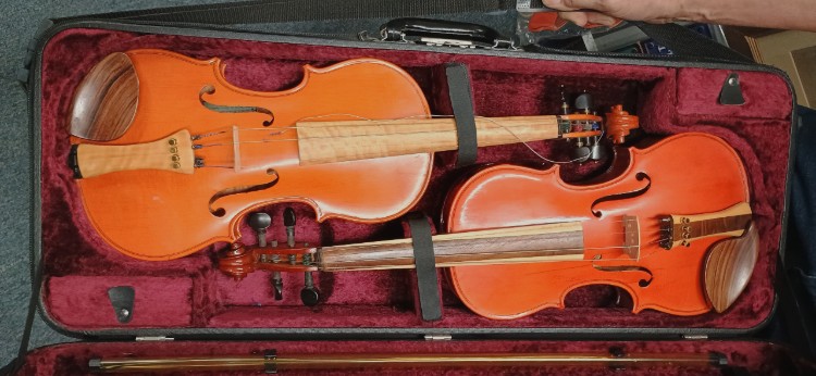 Twin violins in case available at Bahoukas.com