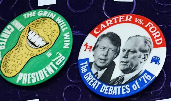 Political pins from 1976 for CARTER vs FORD and "The Grin Will Win" - available at BAHOUKAS ANTIQUE MALL in Havre de Grace, MD