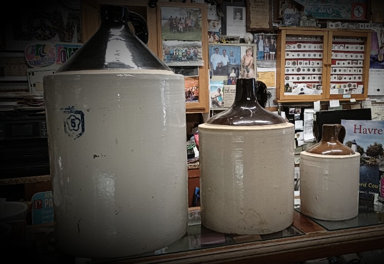 5-3-1 gallon pottery jugs at BAHOUKAS ANTIQUE MALL in Havre de Grace, MD