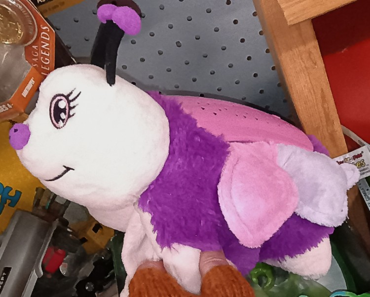 A purple and pink Butterfly Pillow Pet available at BAHOUKAS ANTIQUES in Havre de Grace MD