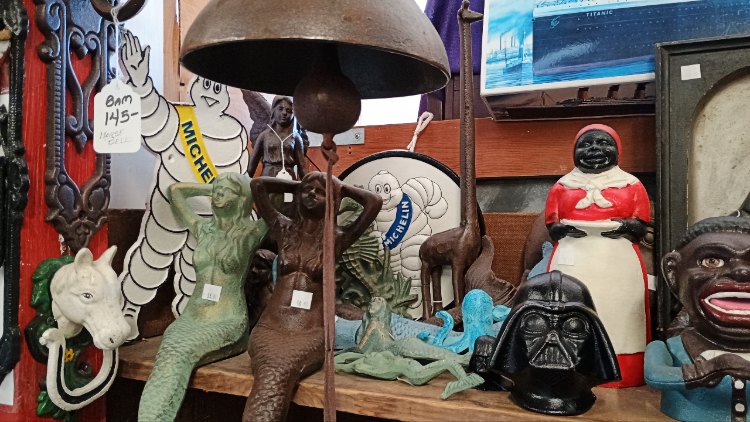 An amazing assortment of cast iron figures from crabs and crocodiles to mermaids and Black Memorabilia and everything in between at BAHOUKAS ANTIQUE MALL in Havre de Grace MD