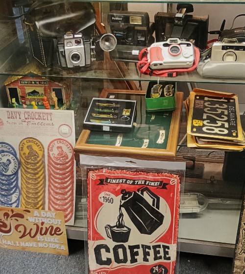 cameras, license plates, metal signs and more - part of the 'Collections' that can be found at BAHOUKAS ANTIQUE MALL in Havre de Grace MD