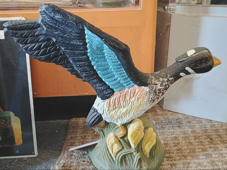 Cast iron duck door stopper for your waterfront living space available at BAHOUKAS ANTIQUE MALL in Havre de Grace