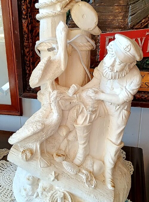 Exquisite base featuring a waterman on a perfect nautical decor lamp available at BAHOUKAS ANTIQUE MALL in Have de Grace.