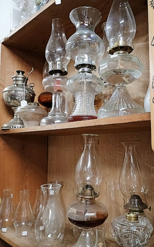 Just a sampling of our oil lamps - perfect for emergencies and a bit of ambiance, available at BAHOUKAS ANTIQUE MALL in Have de Grace.
