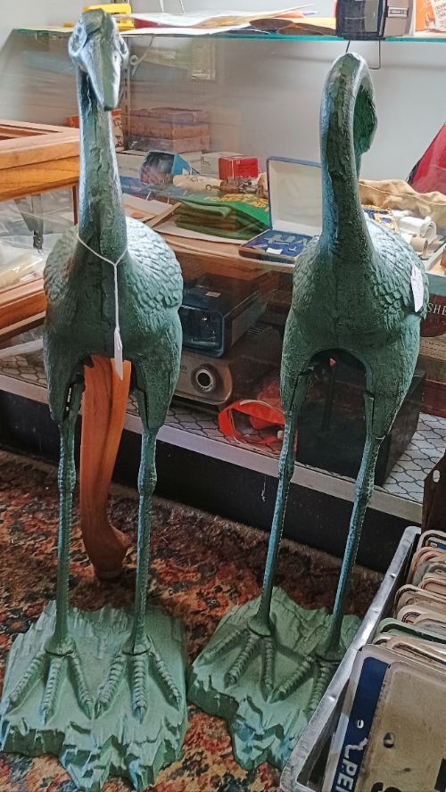Beautiful cast iron heron sculptures available at BAHOUKAS ANTIQUE MALL in Have de Grace.