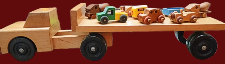 A wonderful selection of wooden toy vehicles are available at Bahoukas Antiques in Havre de Grace
