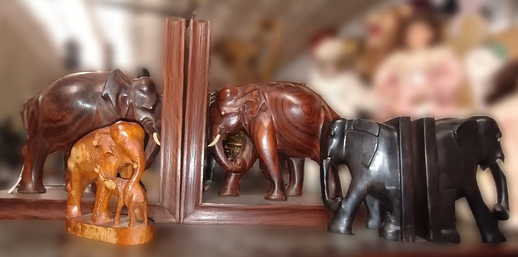 Beautiful carved elephants - including bookends - available at BAHOUKAS ANTIQUE MALL in Havre de Grace, MD.