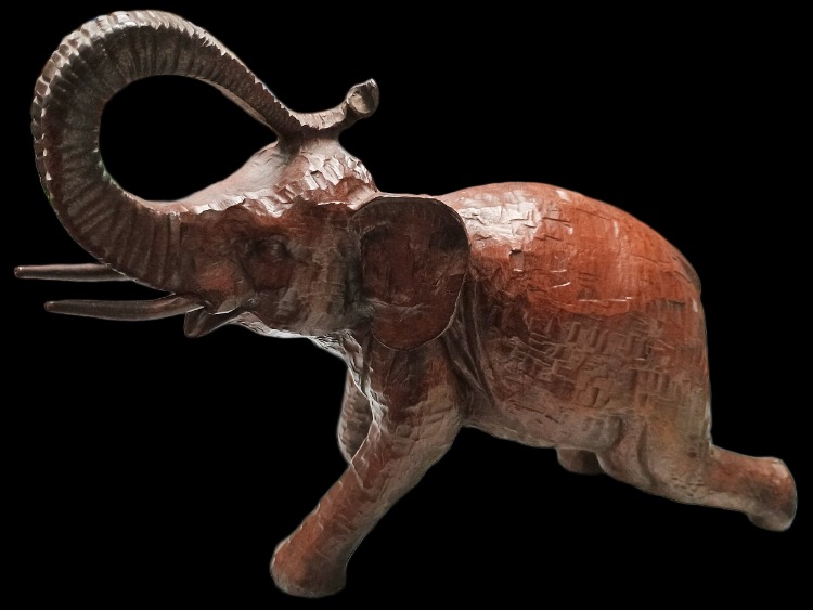 Stunning elephant - made of leather - available at BAHOUKAS ANTIQUE MALL in Havre de Grace, MD.