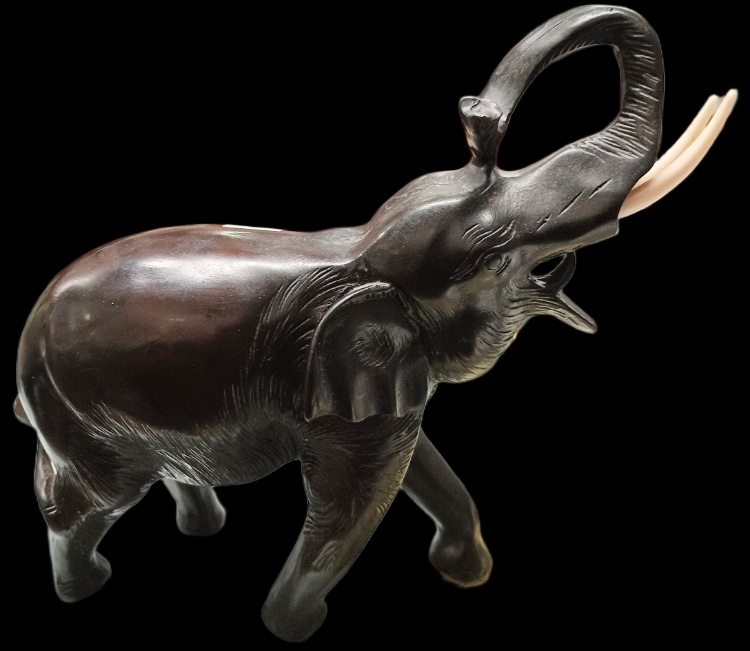 Carved stone elephant available at BAHOUKAS ANTIQUE MALL in Havre de Grace, MD.