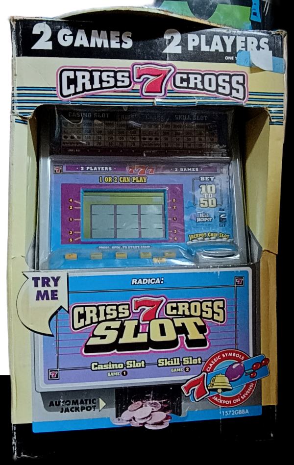 Criss Cross 7 table model kids slot machine - great to add to your collection or a gift idea available at BAHOUKAS ANTIQUE MALL in Havre de Grace