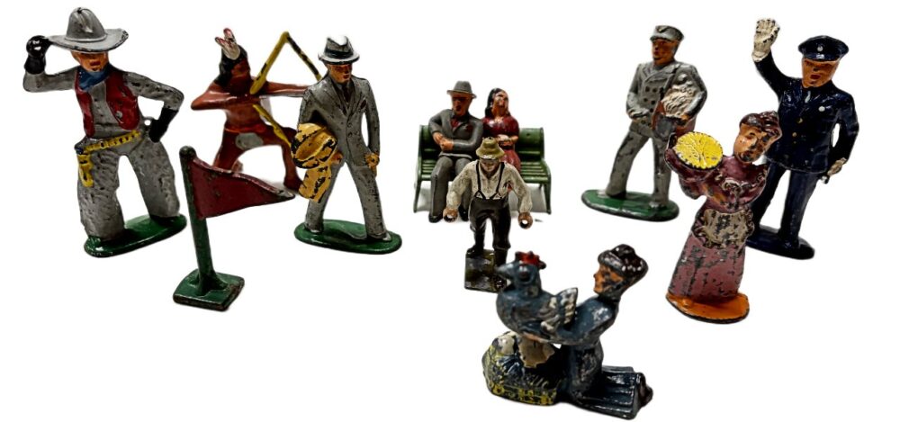 Wonderful variety of leaded figures by Barclay and Manoil including cowboy, couple on bench, policeman, mailman and more.. Available at BAHOUKAS ANTIQUE MALL in Havre de Grace, MD